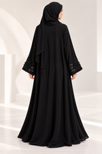 Bild in den Galerie-Viewer laden, Noir Fleur – Luxury Black Abaya with 3D Floral Appliqué & Beaded Embroidery